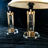 Pair of metacrilic lamps and gold structure