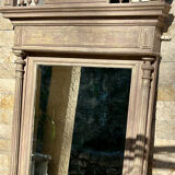 Imposing fireplace mirror in carved and painted wood, 19th century.