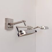 Pair of adjustable vintage wall lights in chrome, France, 1970.