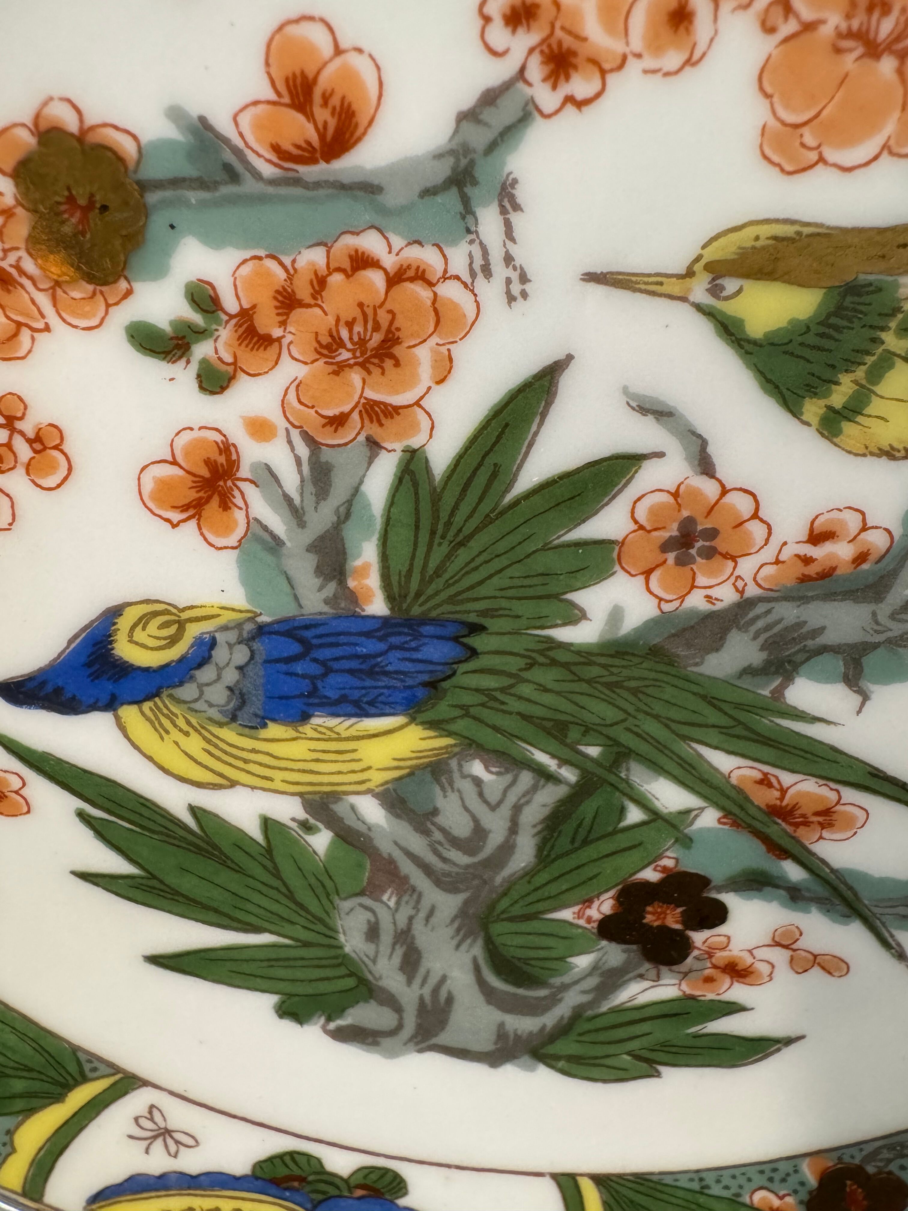 Two Raynaud Limoges plates and Tetard brothers silver.