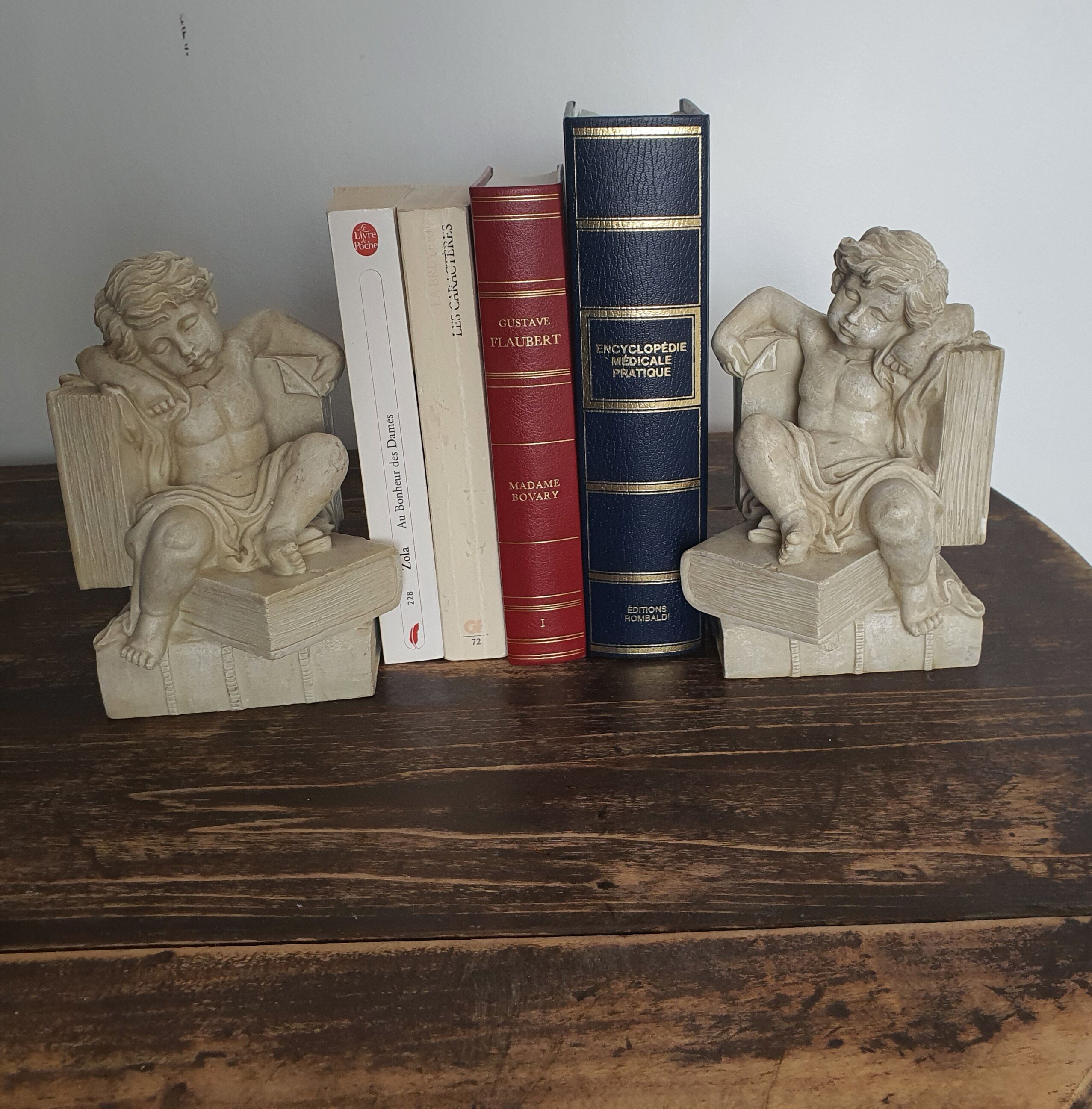 Angel bookends sitting in stone art deco 1950