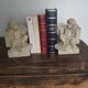Angel bookends sitting in stone art deco 1950