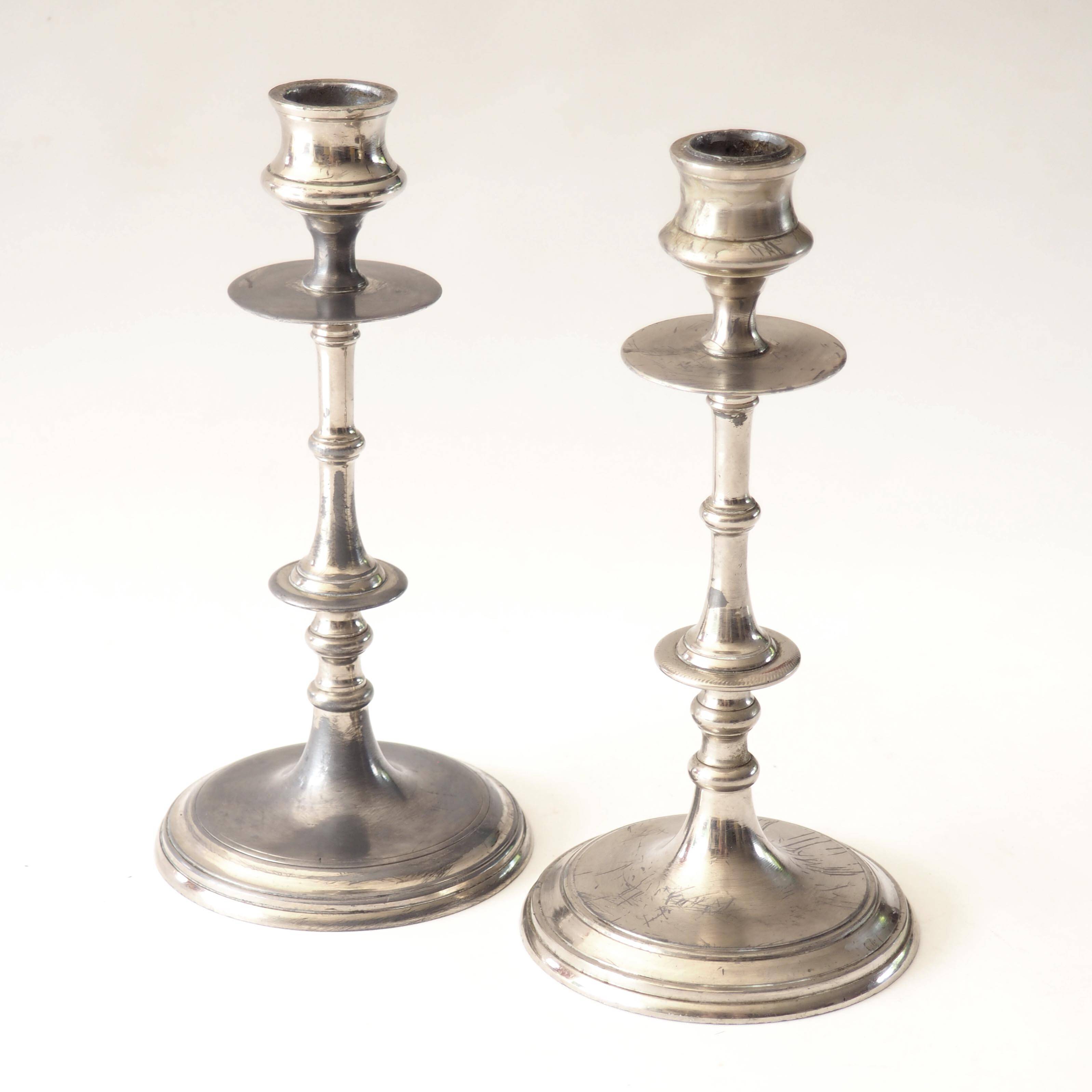 Pair of metal candlesticks