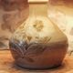Ceramic lamp base with flower decoration
