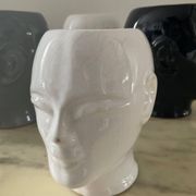 Series of 4 vintage ceramic head vases from the 70s and 80s