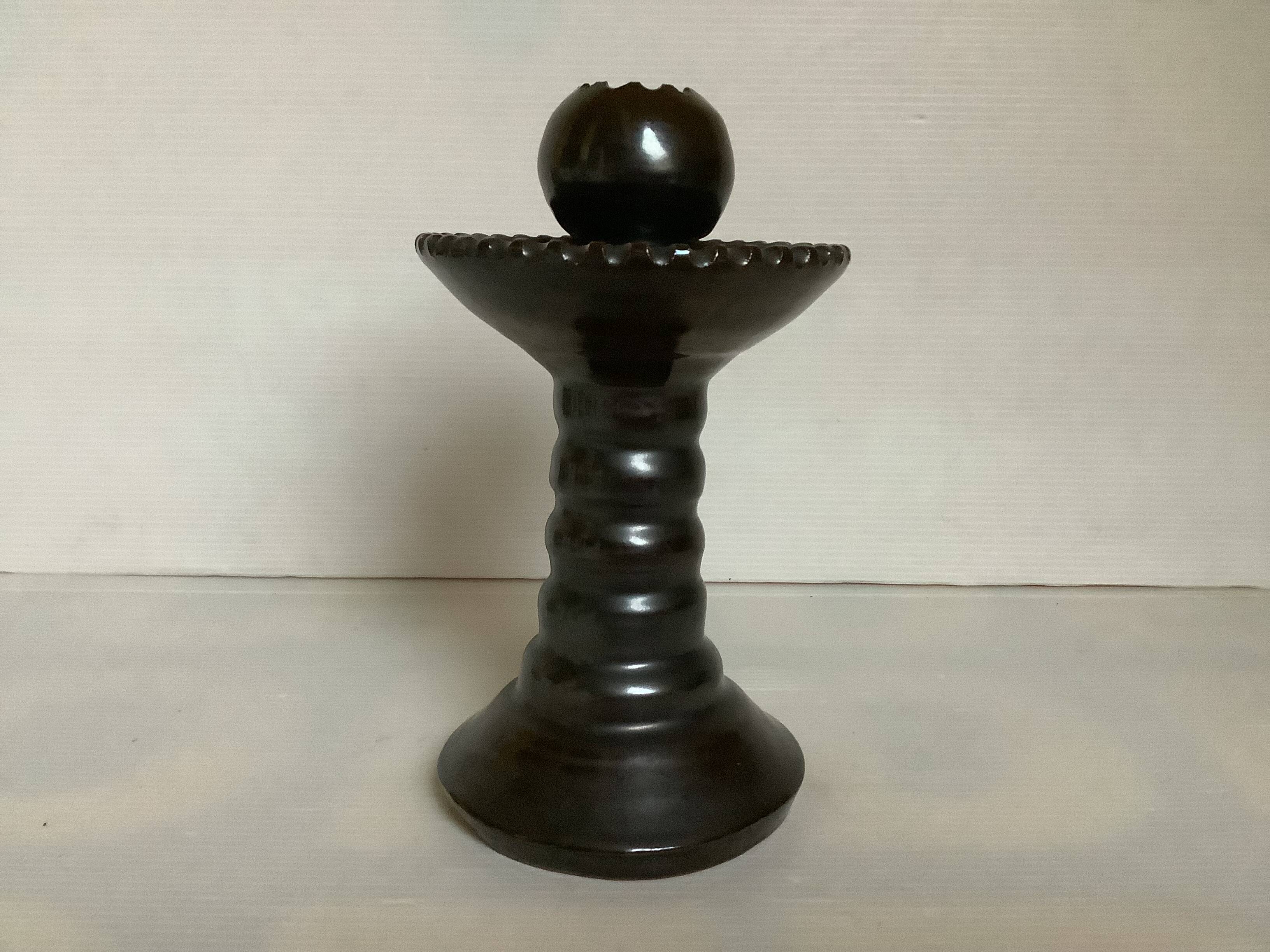 Brown glazed candlestick