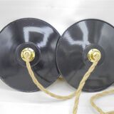 Pair of enamelled sheet metal suspensions