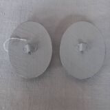 Pair of patinated oval woodwork