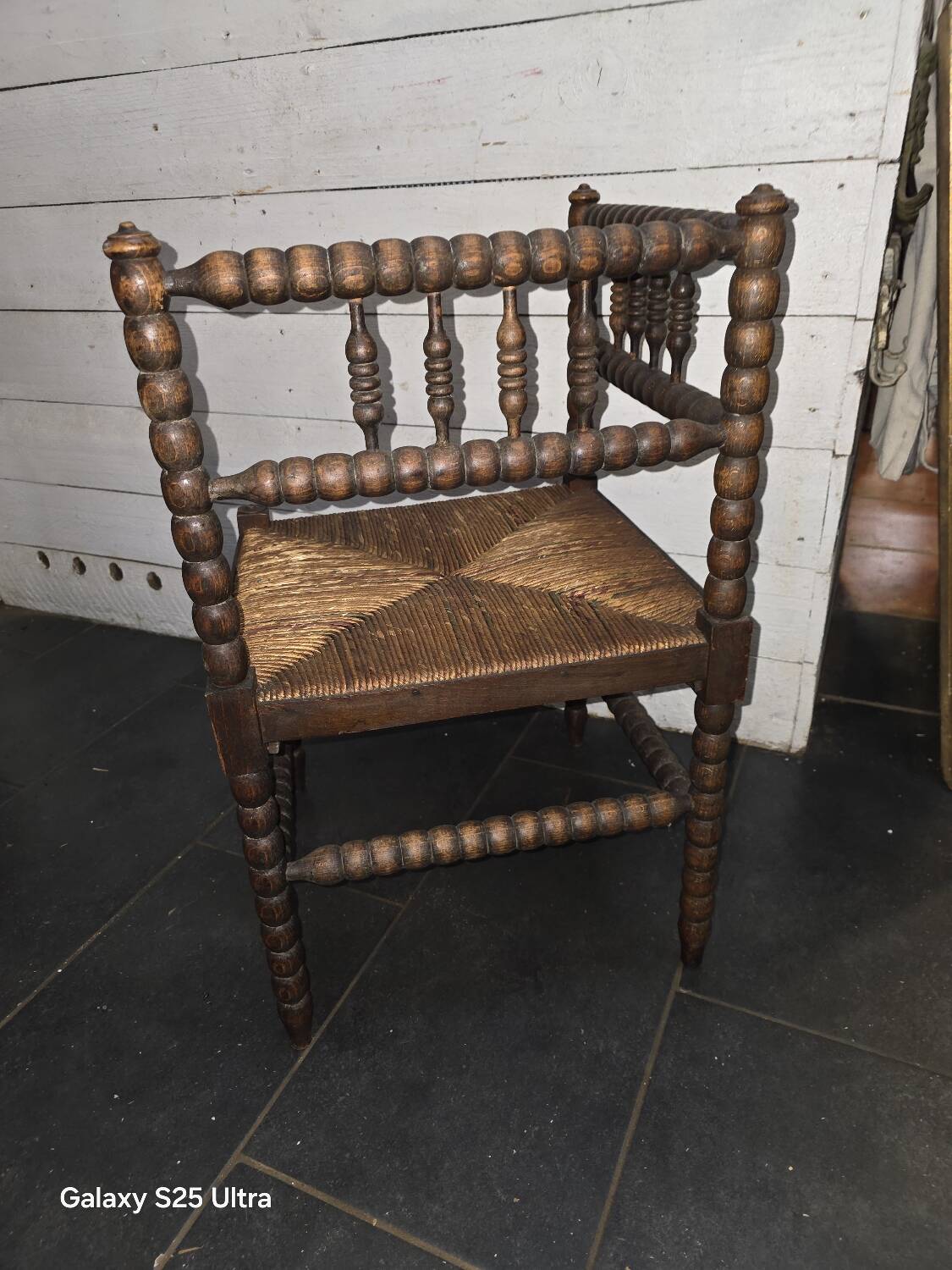 Antique corner fireplace armchair