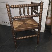 Fauteuil de coin de cheminée ancien