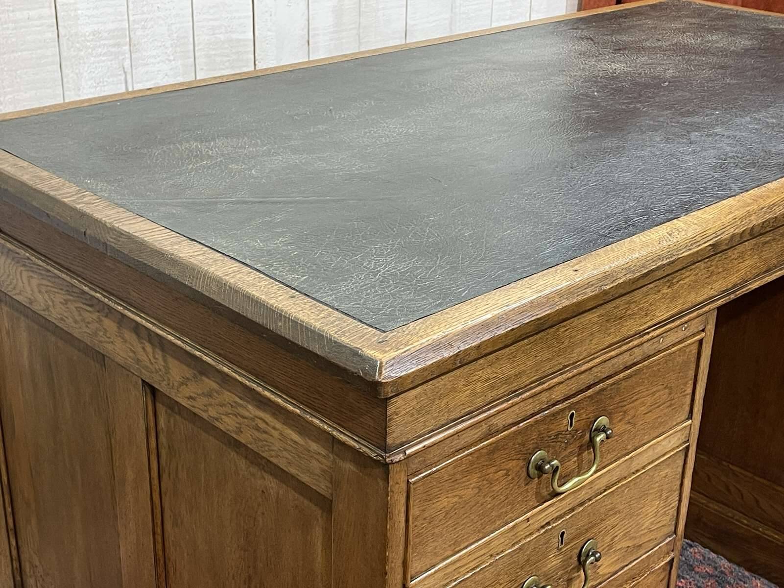 Early 20th century English flat desk in oak