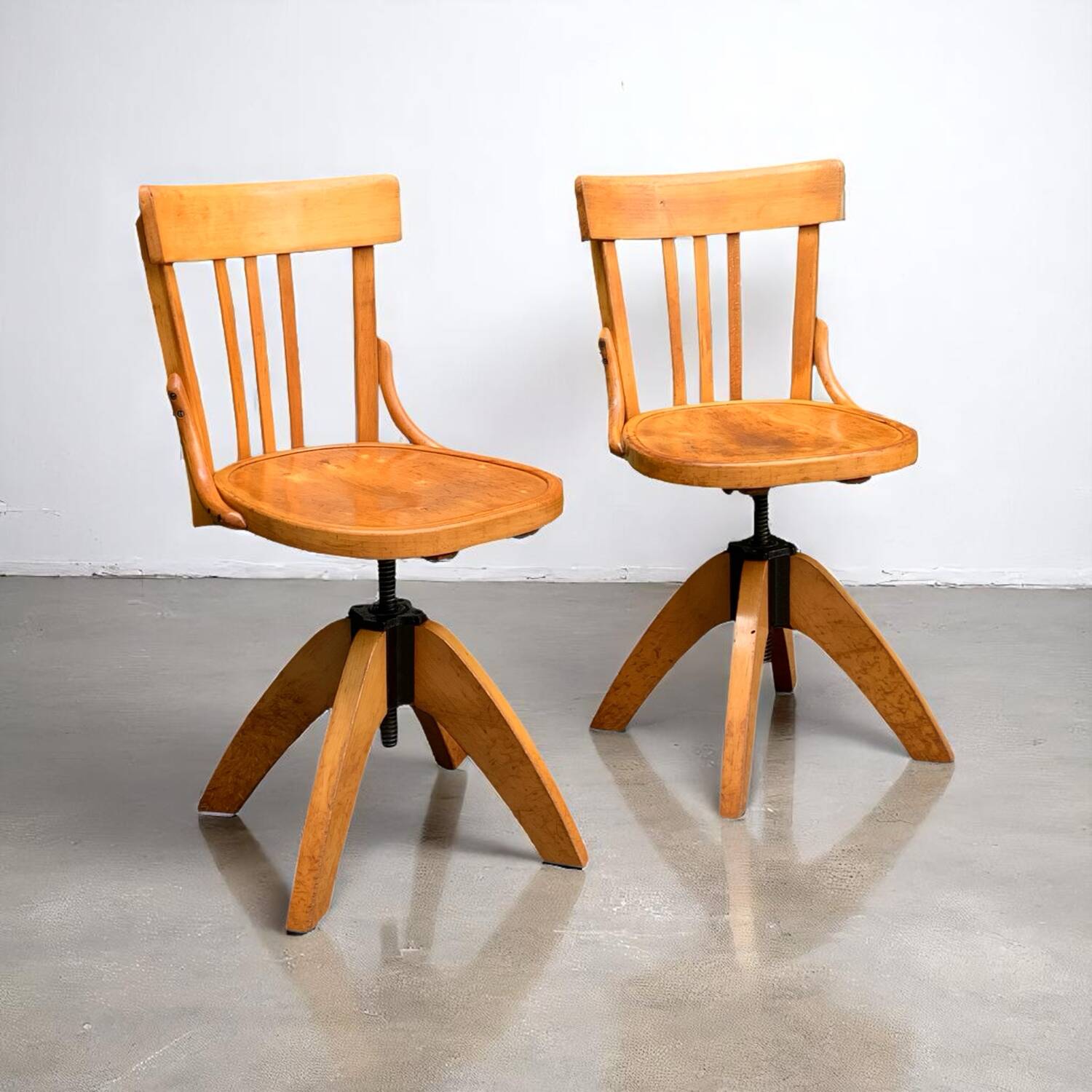 Pair of Baumann rotating screw chairs 1960