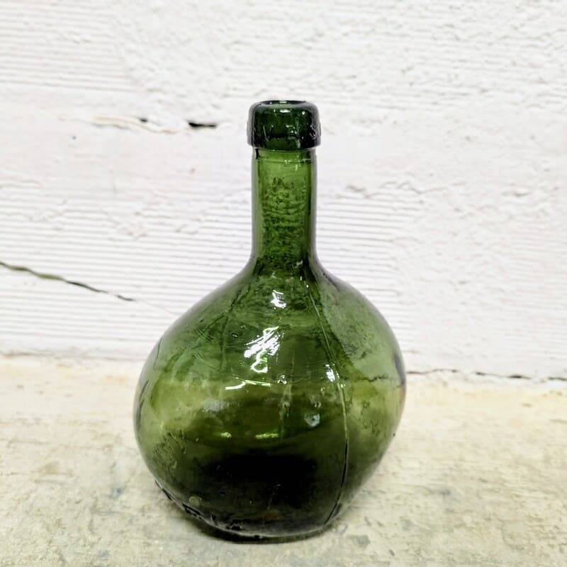 Oval green demijohn