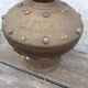Pot in hammered copper and natural stones mounted in lamp india asia