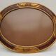 Cadre art nouveau ovale  en bois, décor flamé et  or