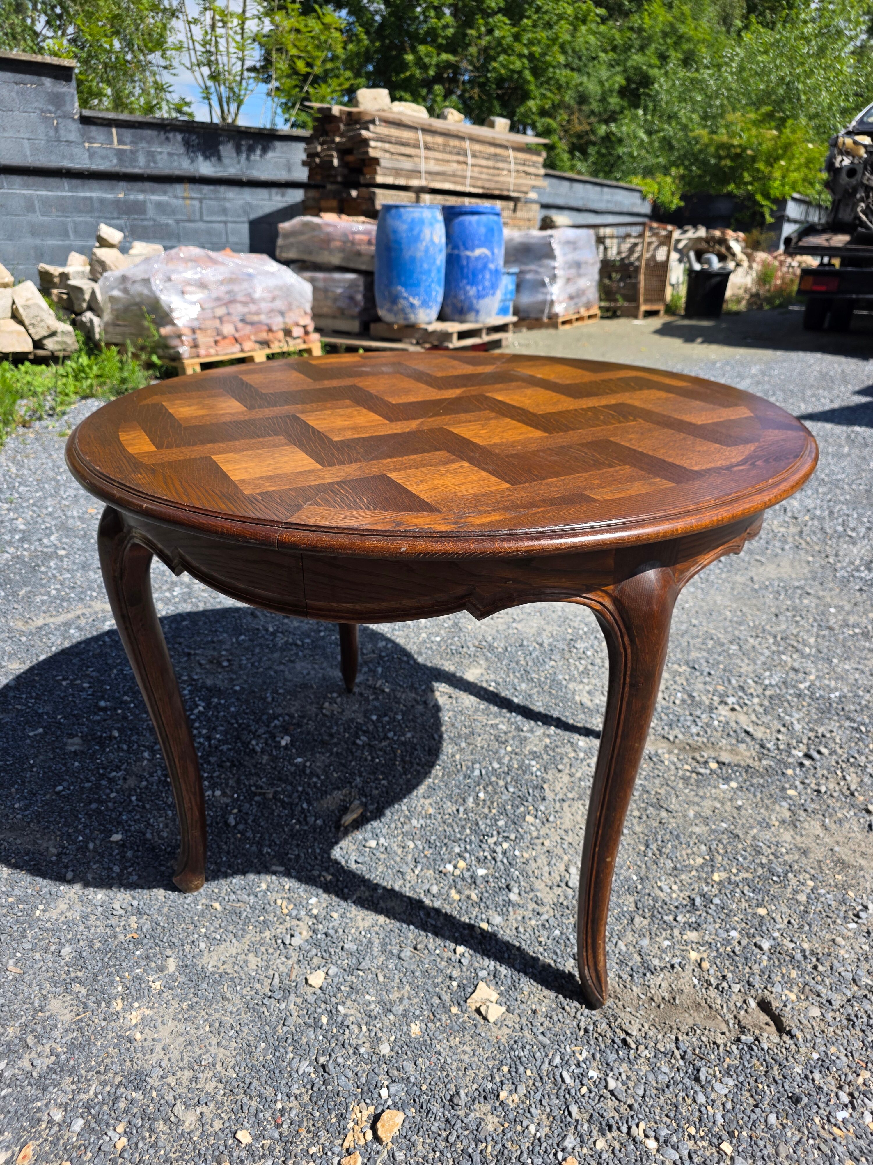 Extendable table in Louis XV style in oak (2 extensions)