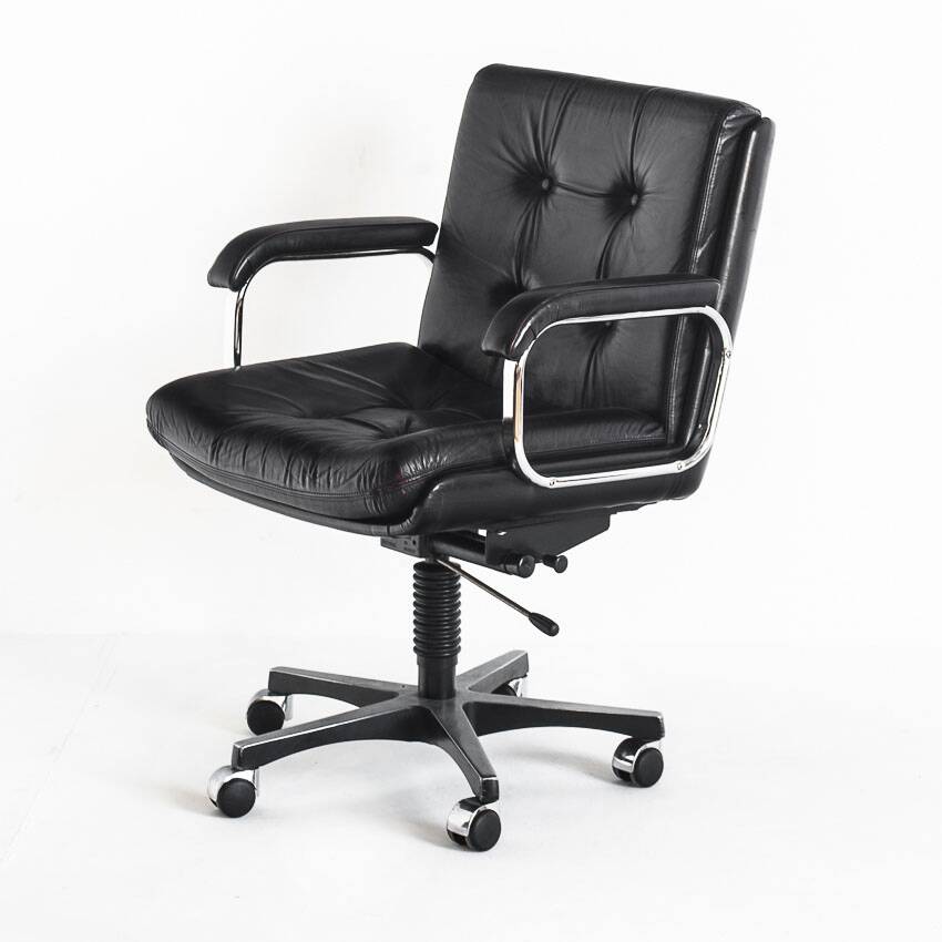 Vintage leather armchair. Swivel, on casters, multi-position. Norway, 1970s.