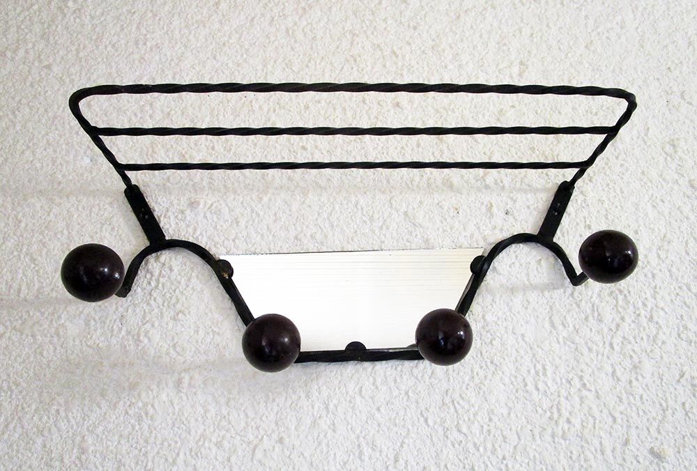 Wrought iron wall rack
