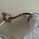 Antique gilded bronze wall lamp with frosted glass tulip