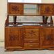 Solid walnut sideboard, moustache legs, black marble top.