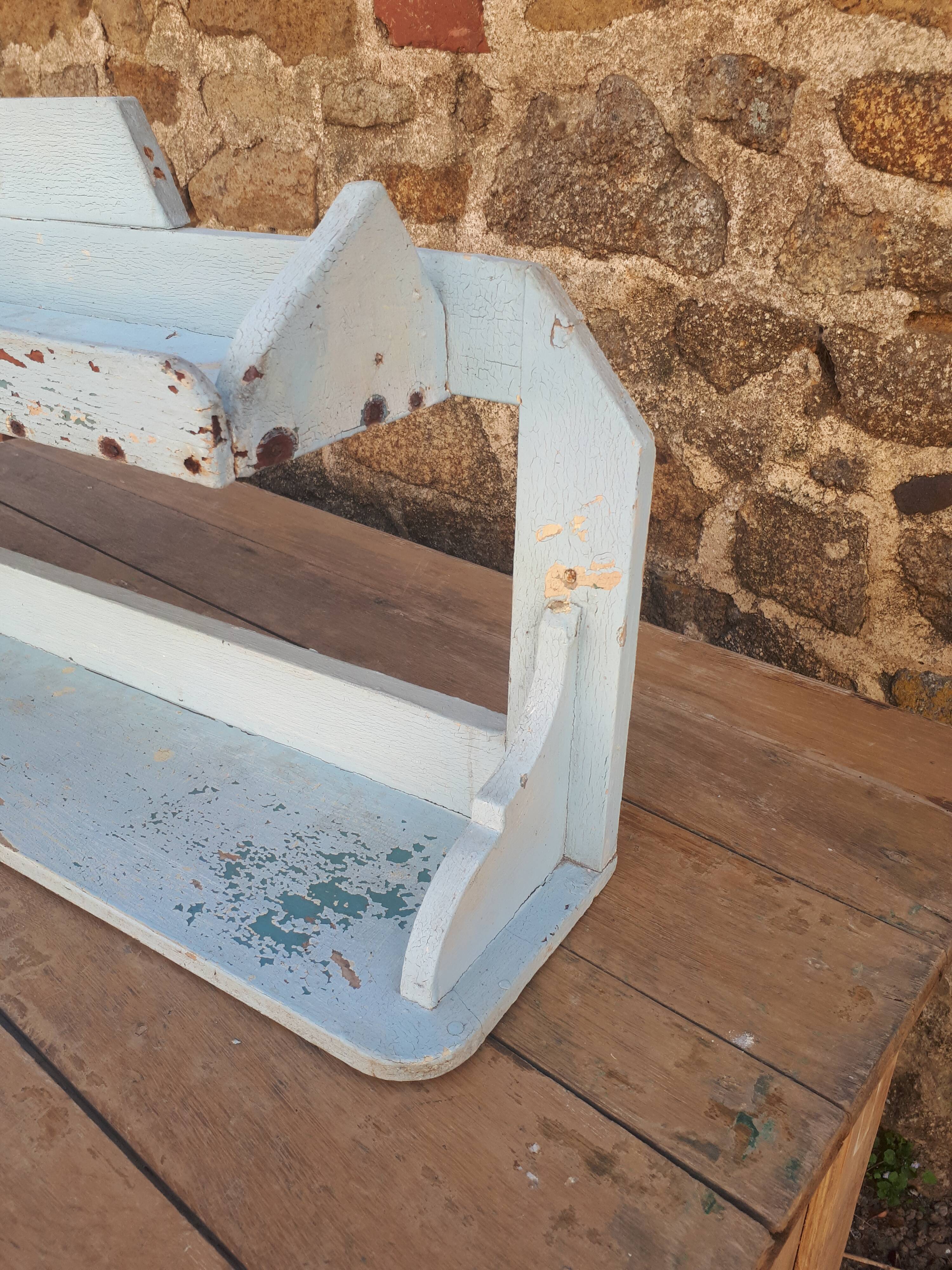 Blue wooden wall shelf