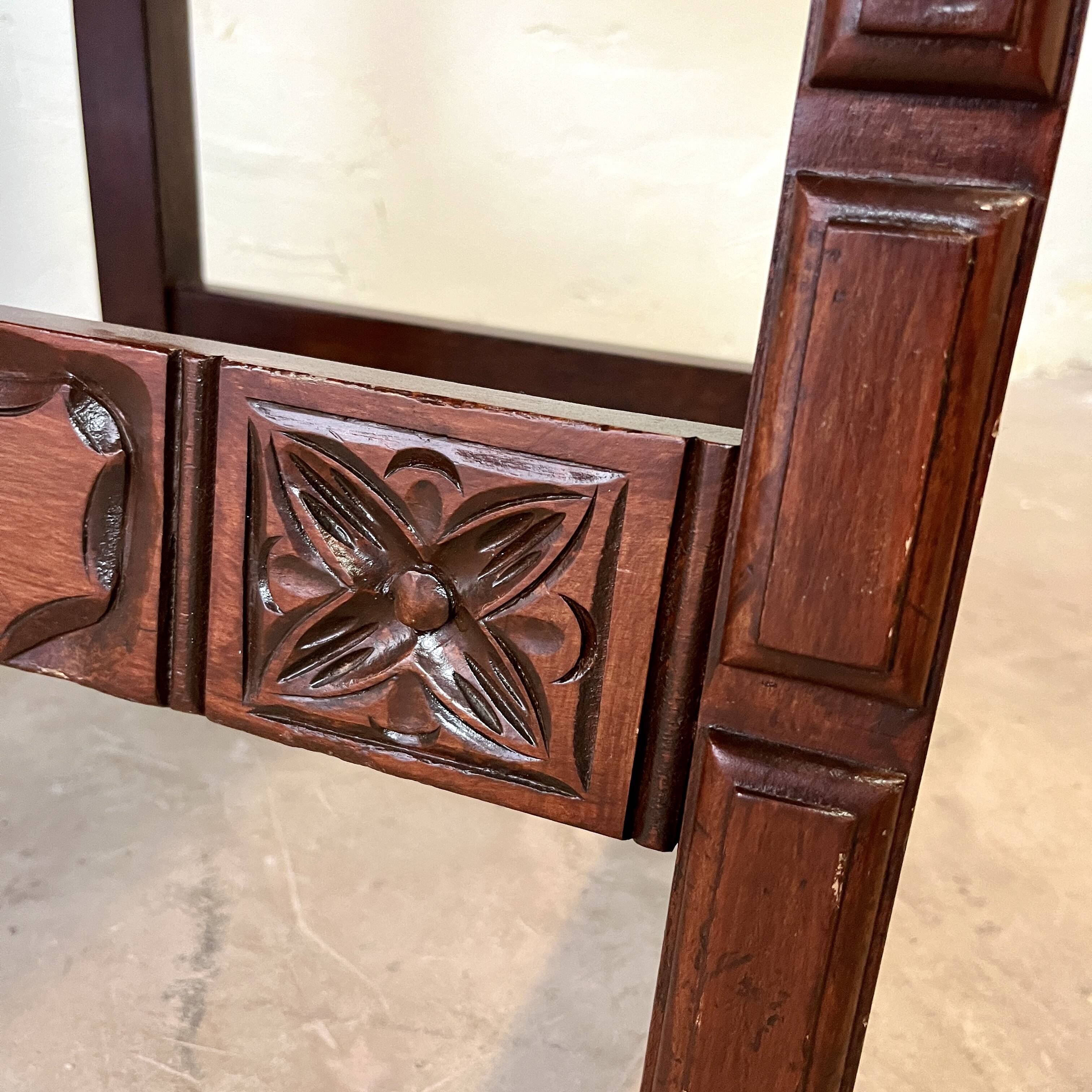 Spanish chair in leather and carved wood, 1950s/60s.