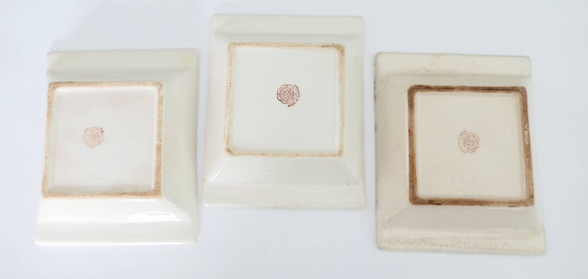 Set of three German ceramic catchalls from the 1950s.