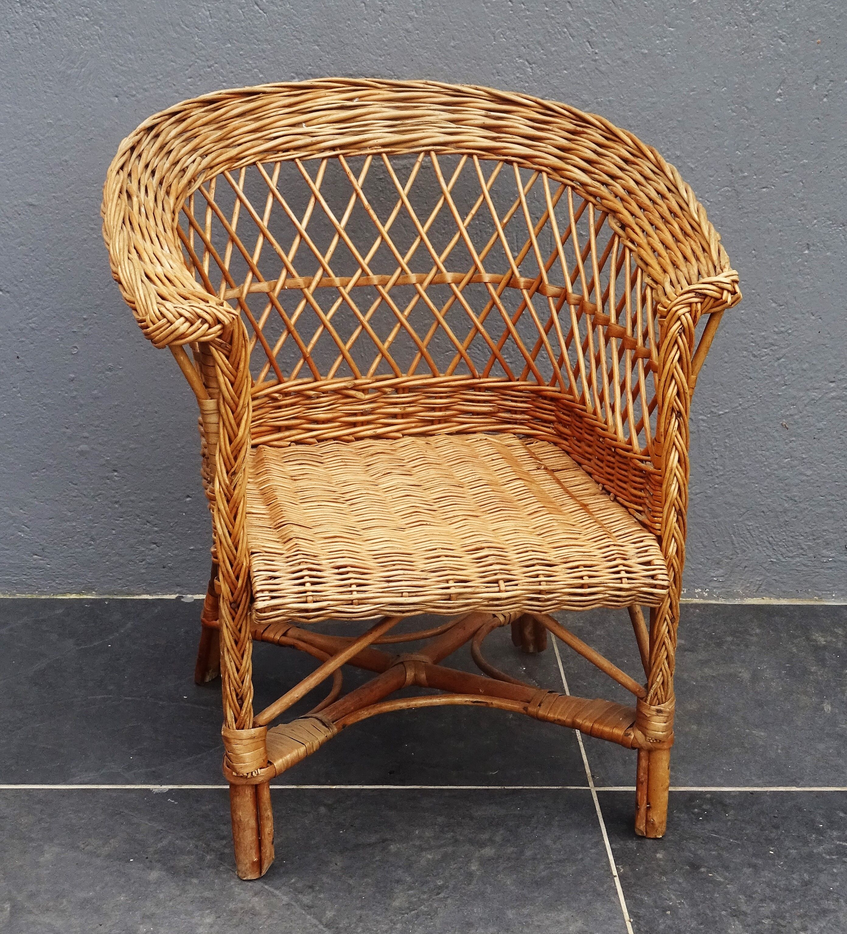 Vintage rattan wicker child's armchair