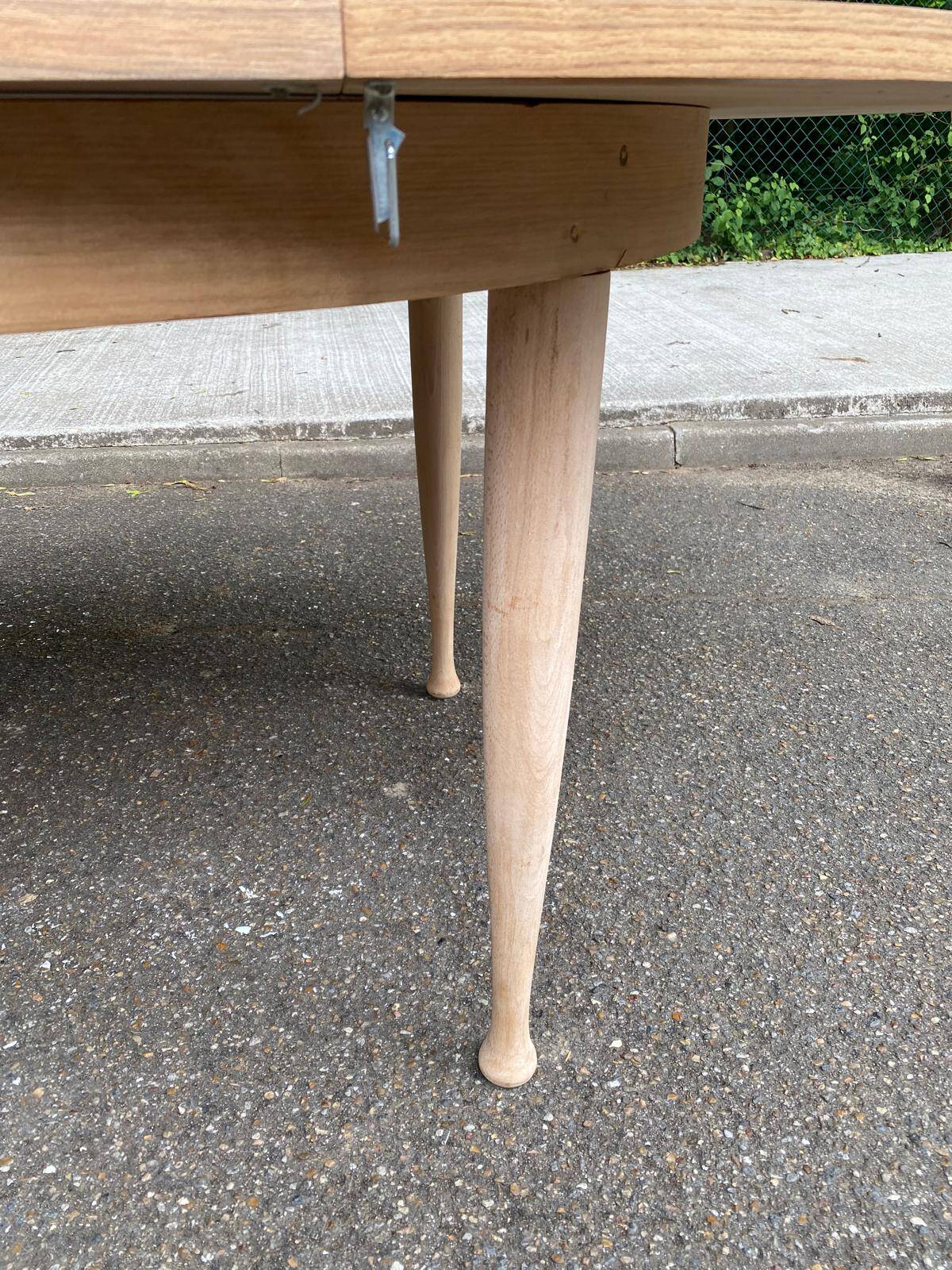 Renovated round extendable Scandinavian dining table in teak, 110cm.