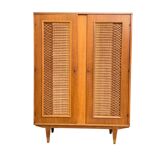 Rattan wardrobe and its compass-legged chest of drawers, 1960