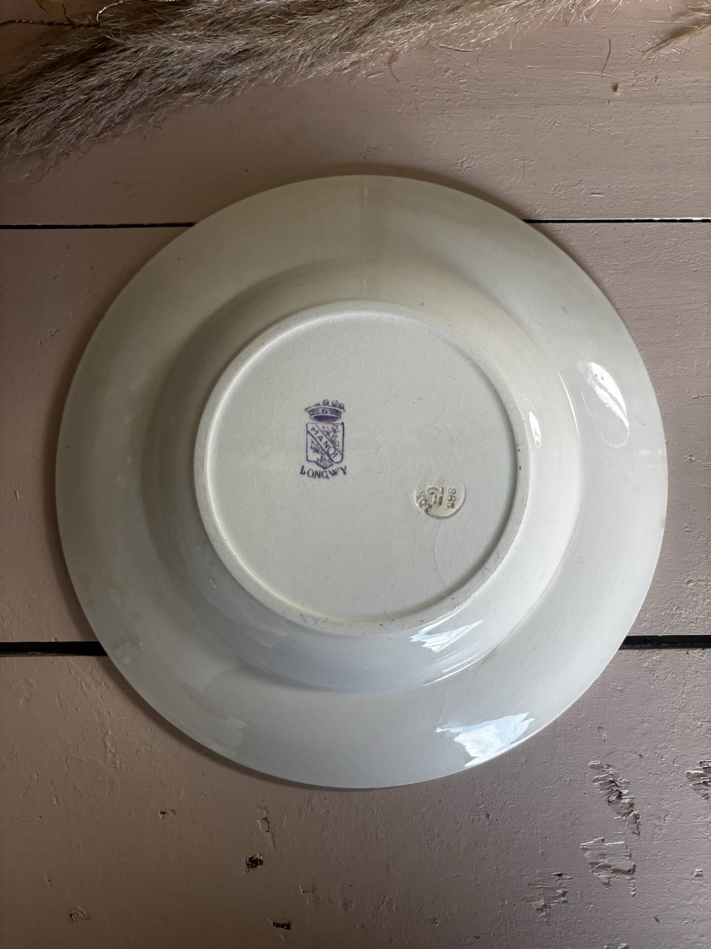 Ancienne assiette creuse en terre de fer Longwy Hanoï