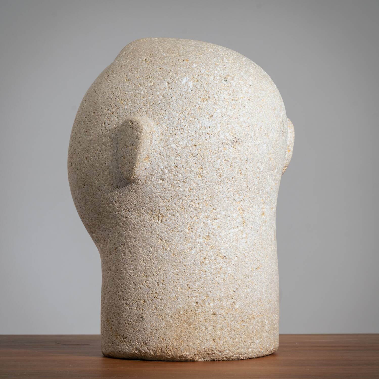 Modernist sculpted male bust in sandstone
