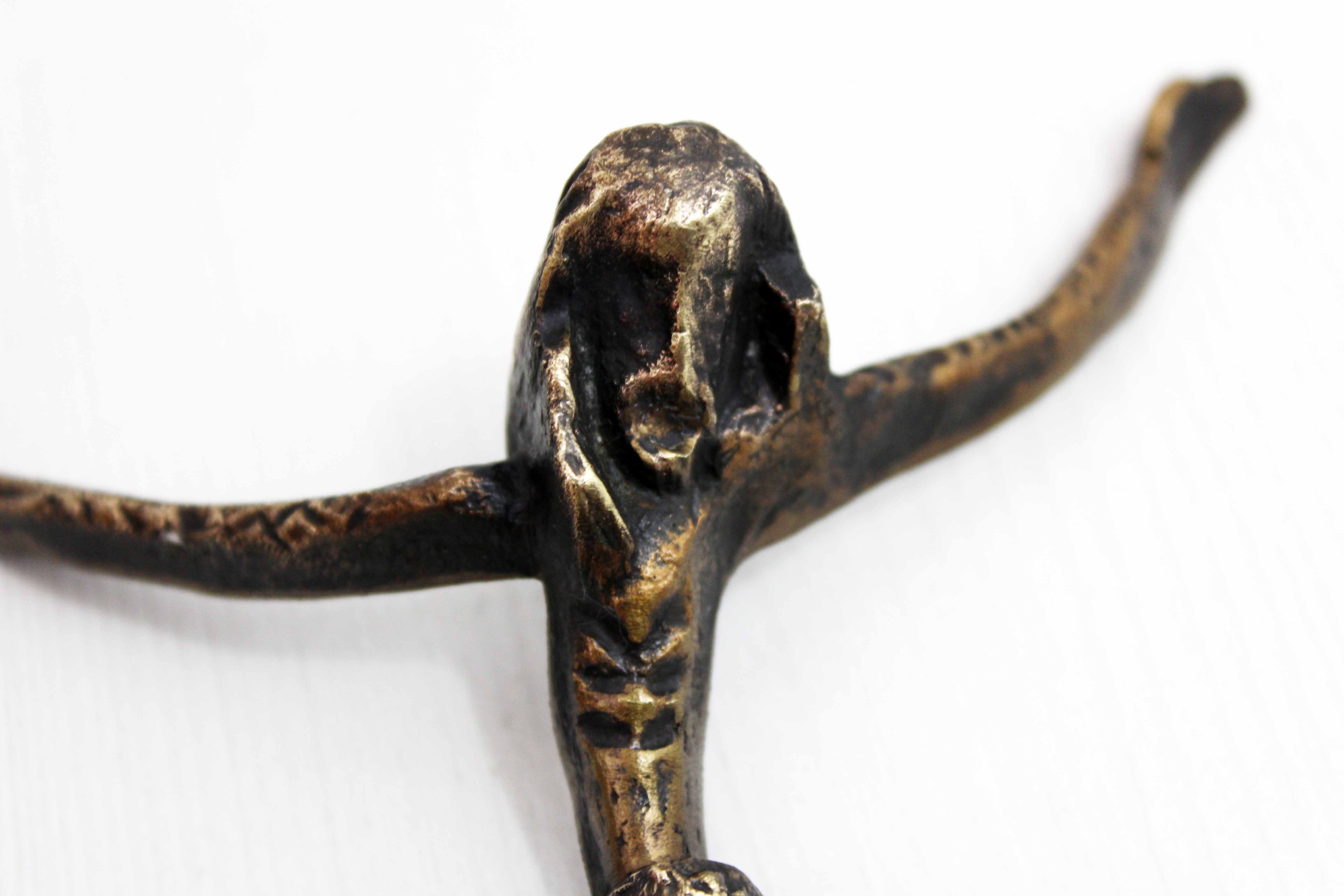 Modernist Christ in bronze