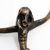 Modernist Christ in bronze