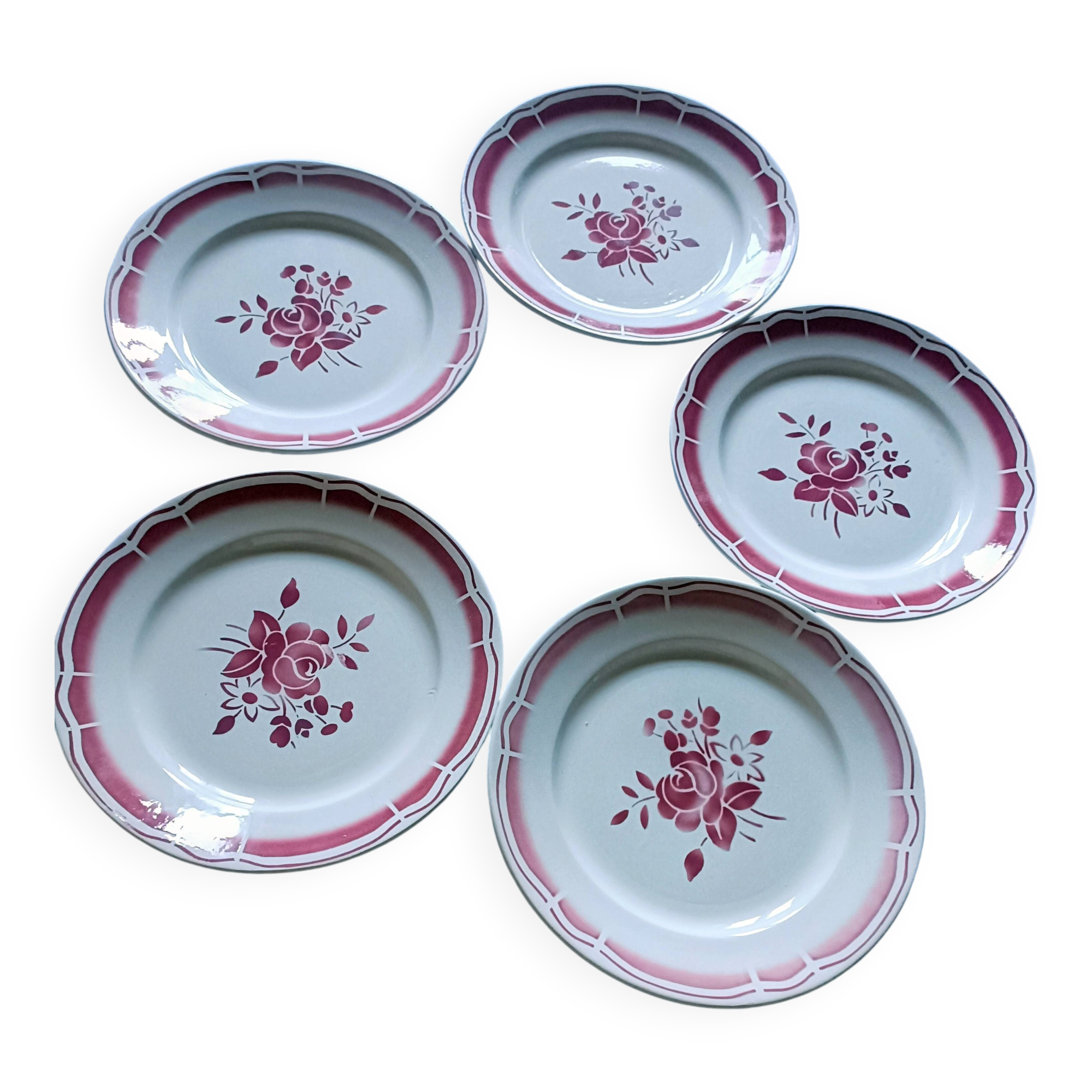 Five numbered opaque porcelain plates from Badonviller.