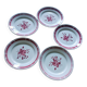 Five numbered opaque porcelain plates from Badonviller.
