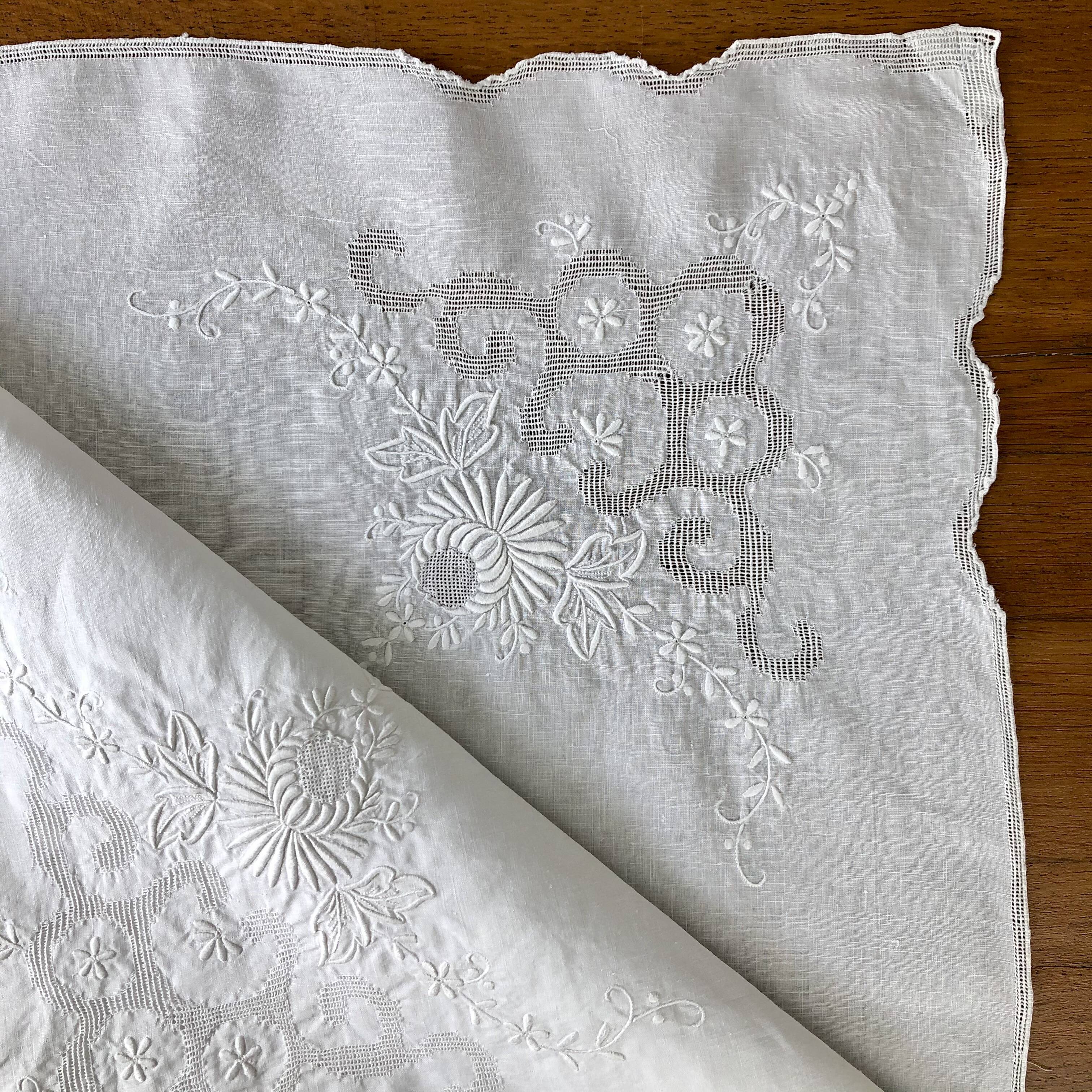 White coat embroidered floral patterns