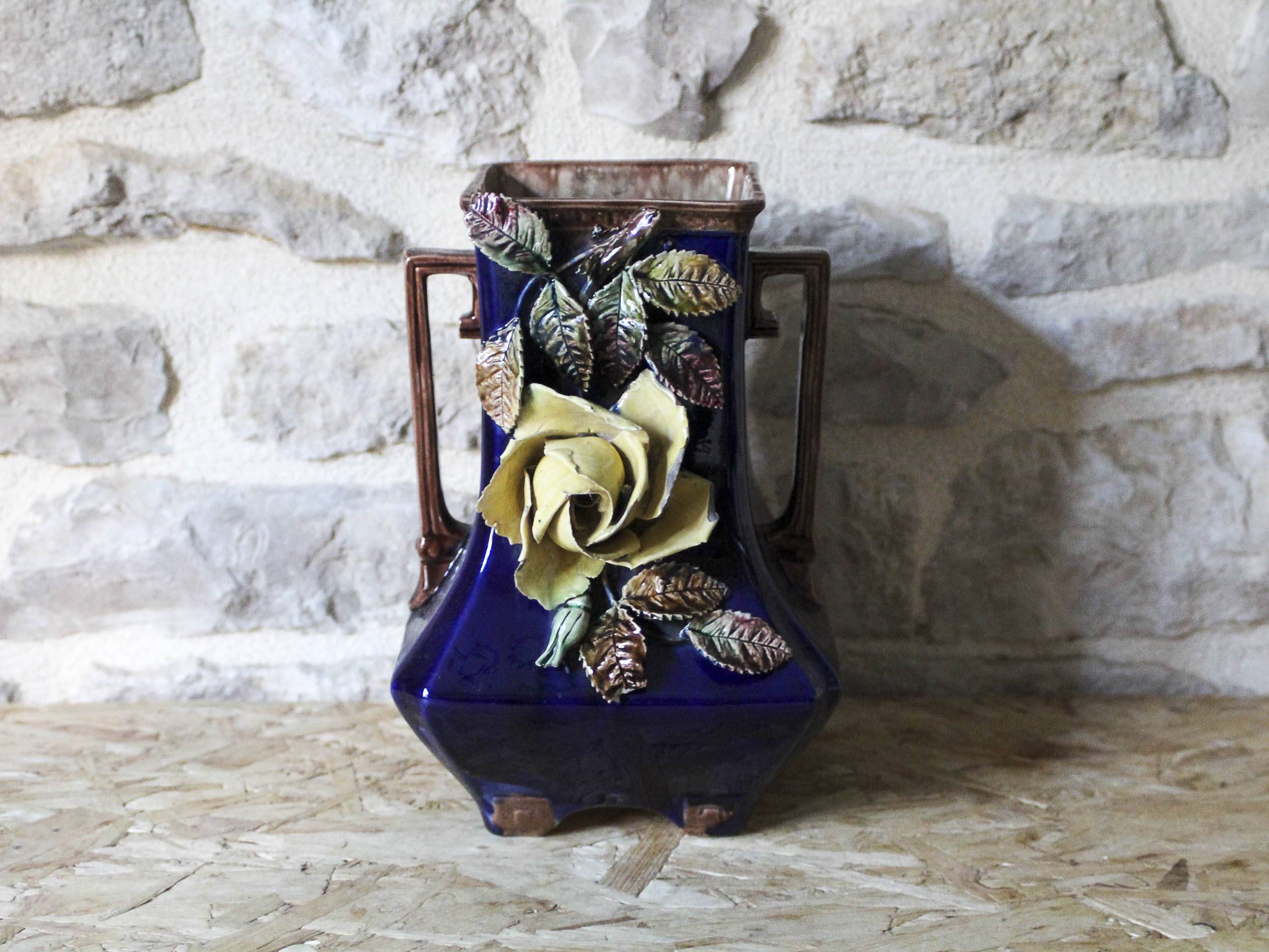 Slip vase decorated with flowers