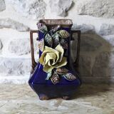 Slip vase decorated with flowers