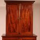 small two-body solid mahogany desk from the early 19th century with writing surface