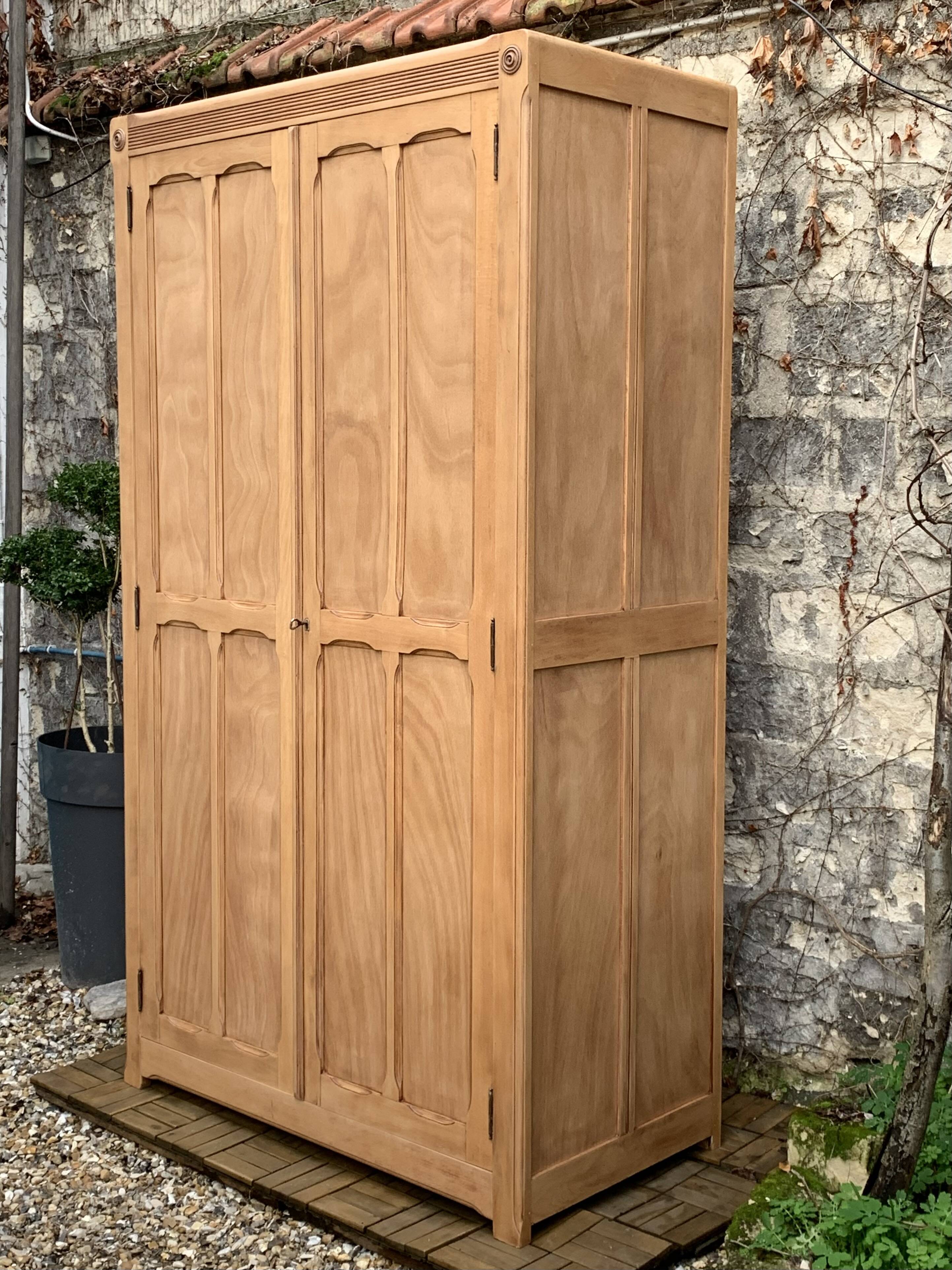 Parisian paneled cabinet in raw wood, 1940