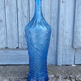 Blue glass decanter with a moon star motif