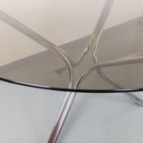 Vintage round dining table in smoked glass and chromed metal, Space Age style, from the 70s