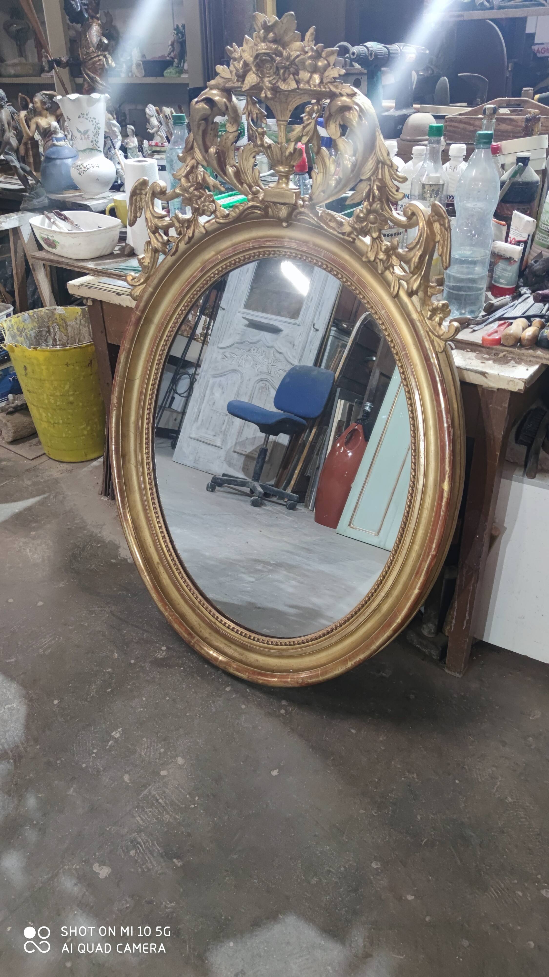 Mirror with a gilt medallion pediment, 1840