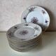 9 assiettes à dessert en porcelaine