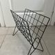 Black metal wire magazine rack