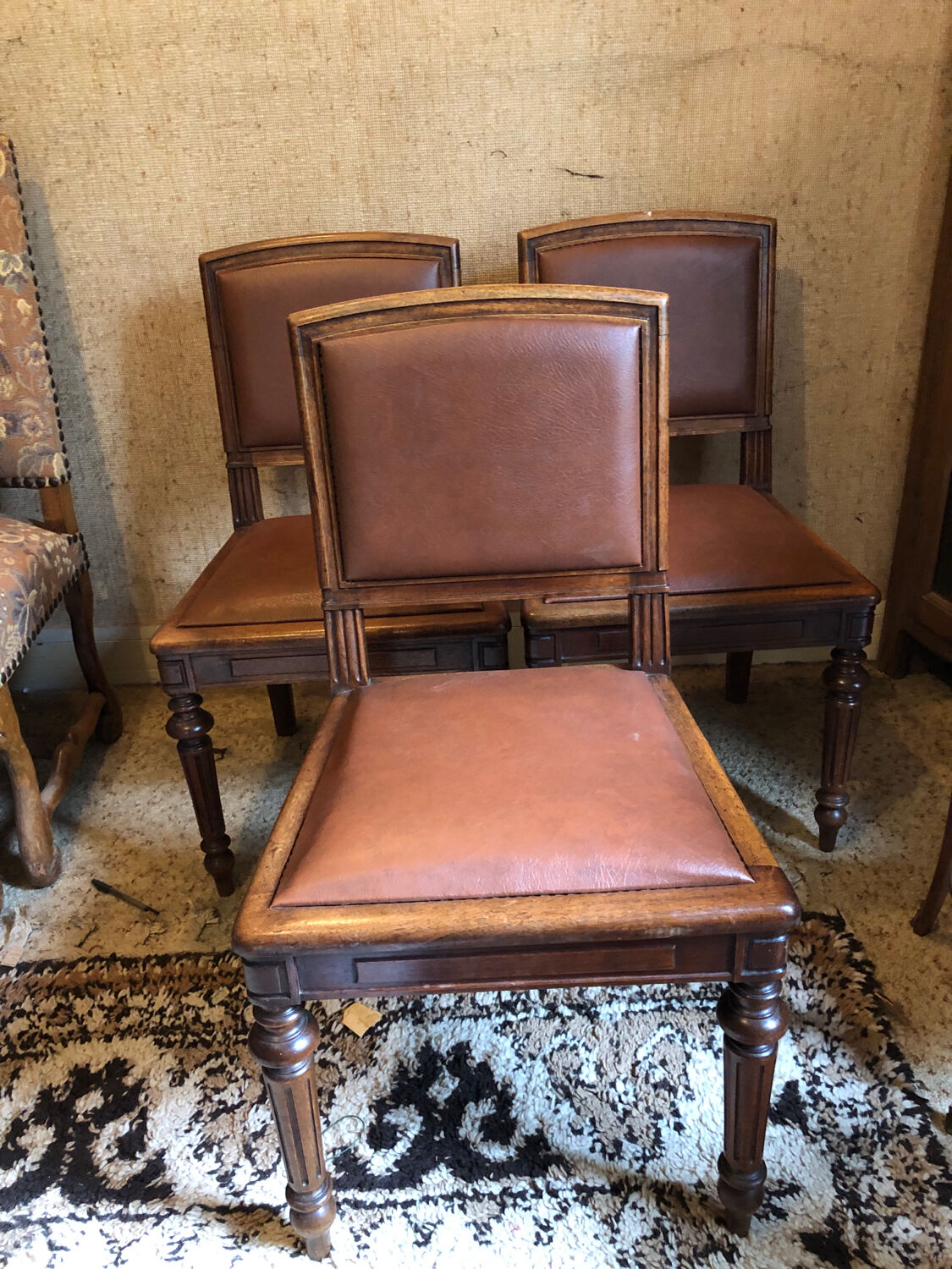 Leather and wood chairs