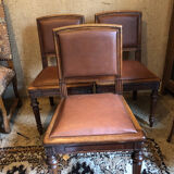 Leather and wood chairs