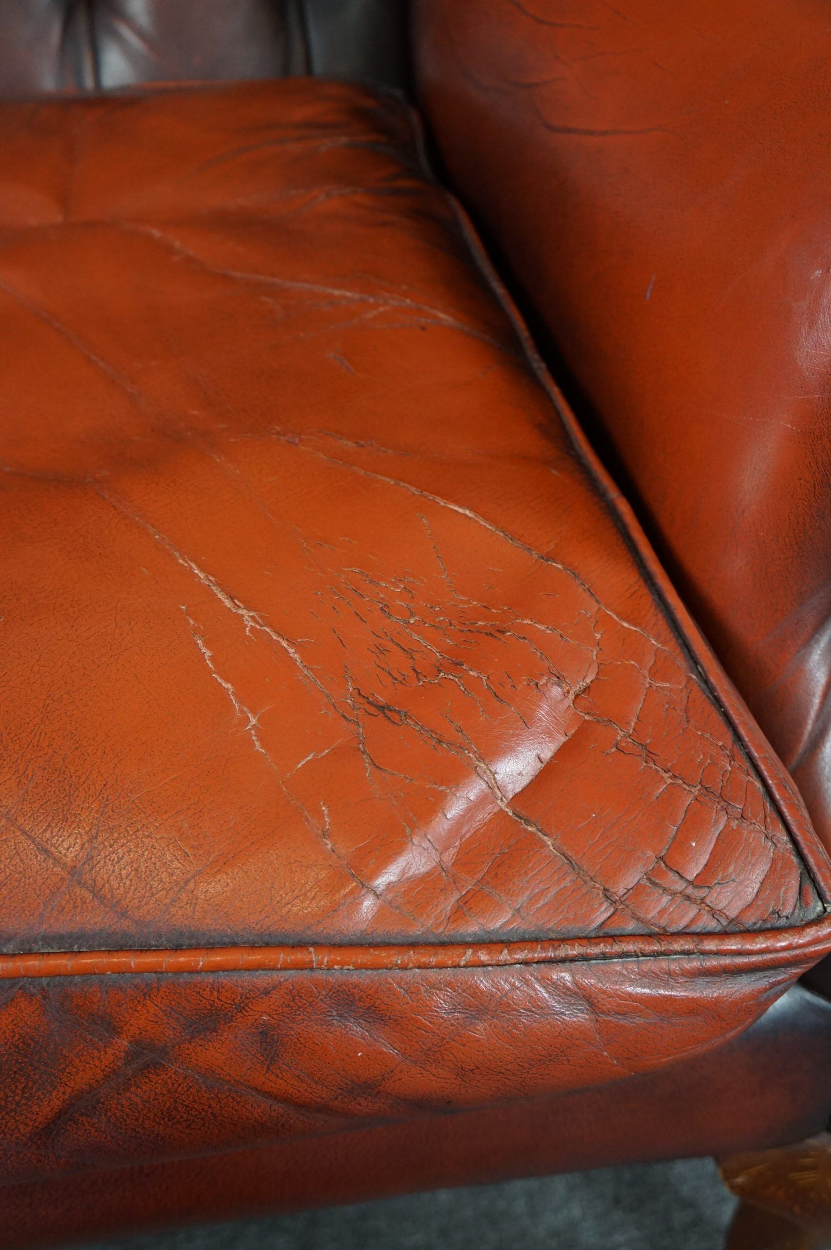 Fauteuil Chesterfield en cuir de vachette