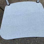 2 beige Formica and steel chairs from the 1980s.